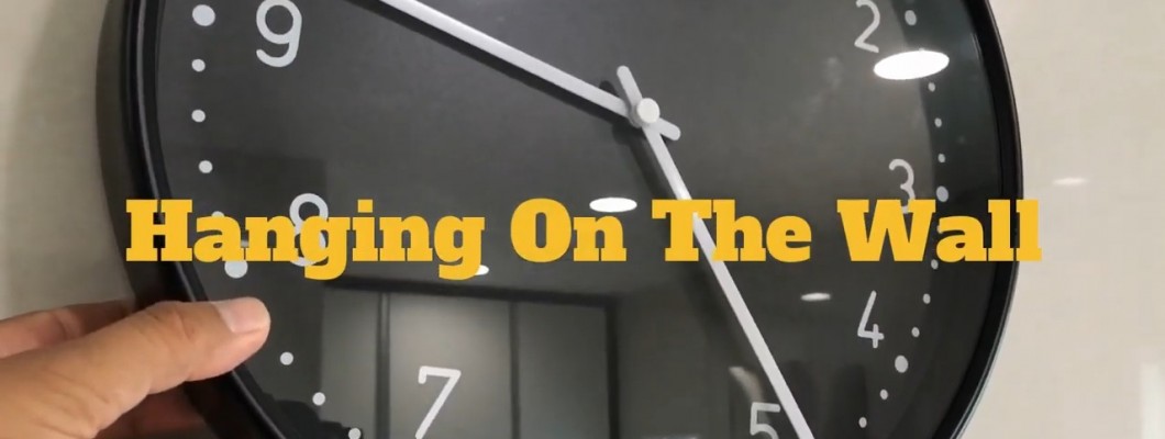 How to hang a clock on the wall, but without making any holes?